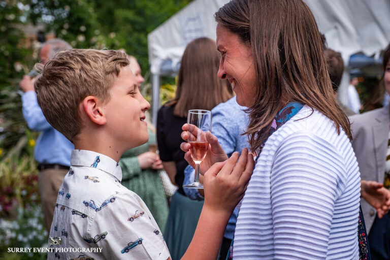 Garden party celebration - documentary wedding photographer in Surrey