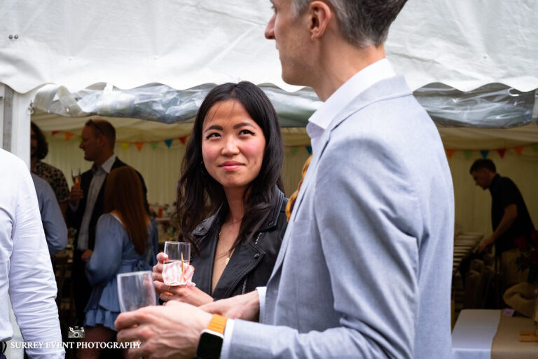 Garden party celebration - documentary wedding photographer in Surrey