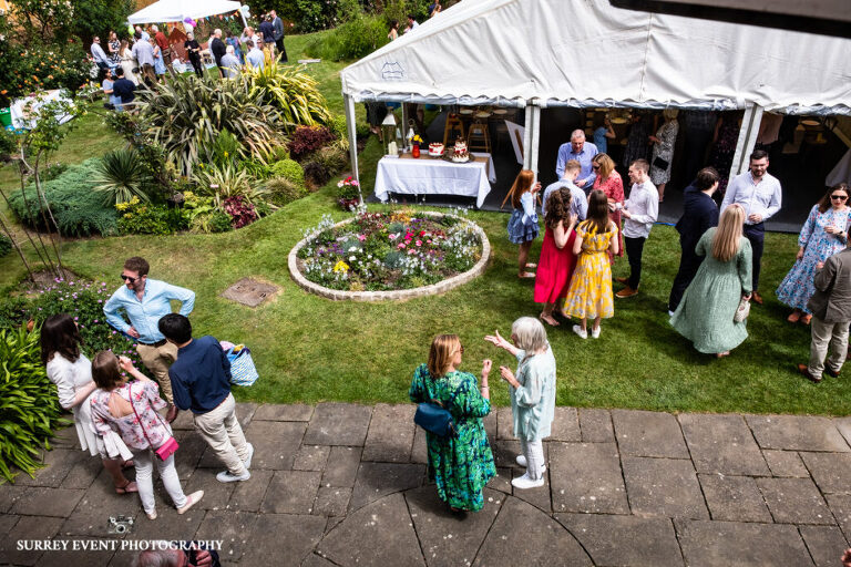 Garden party celebration - documentary wedding photographer in Surrey