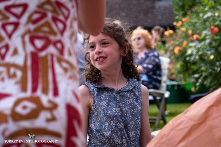 Garden party celebration - documentary wedding photographer in Surrey