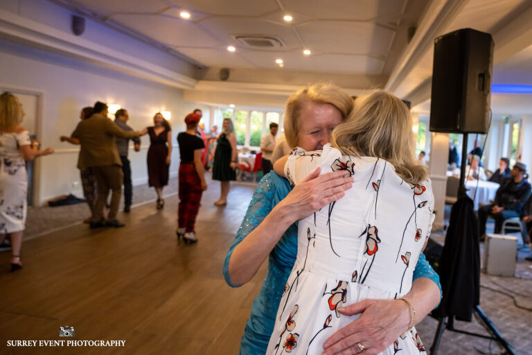 Documentary wedding photography in Surrey at a Scottish ceilidh