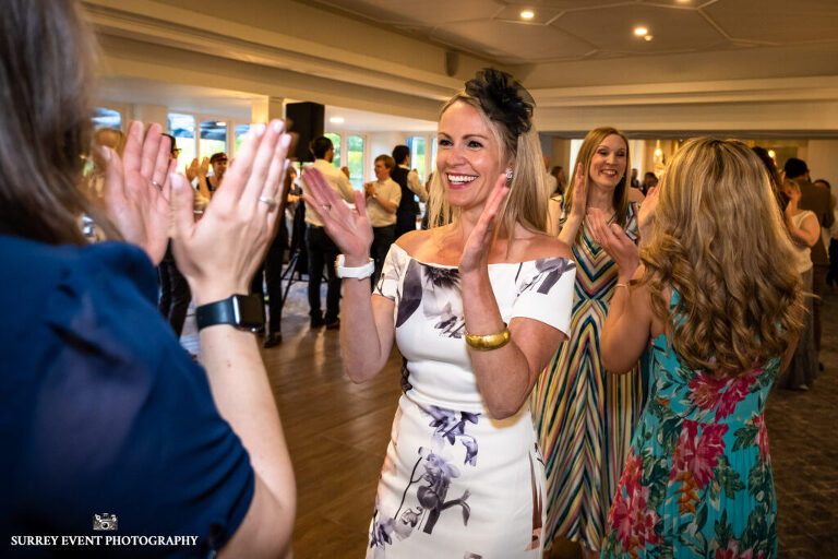 Documentary wedding photography in Surrey at a Scottish ceilidh