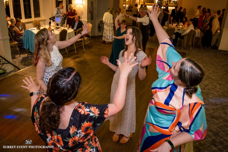 Documentary wedding photography in Surrey at a Scottish ceilidh