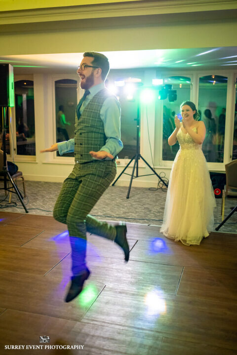 Documentary wedding photography in Surrey at a Scottish ceilidh